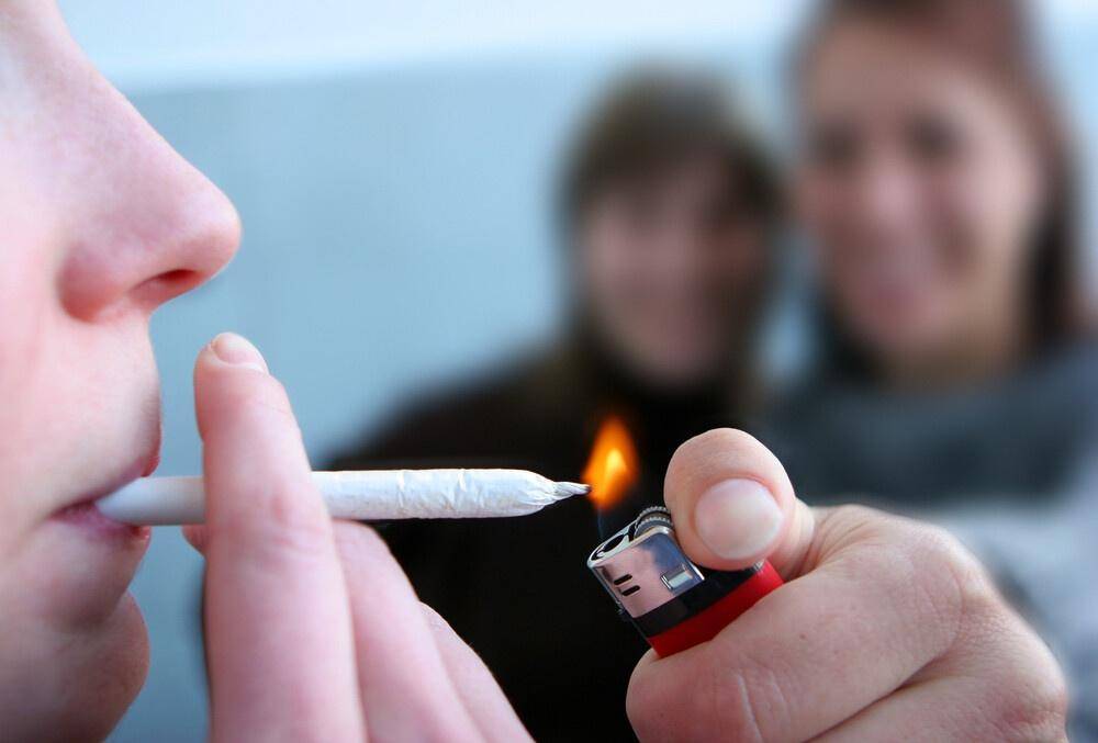 women smoking marijuana